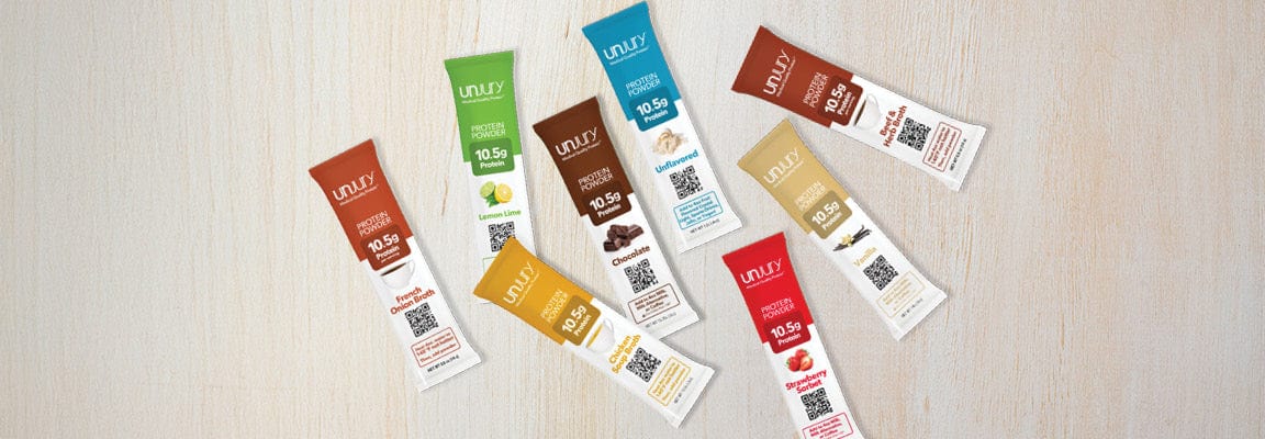 Assorted Unjury flavors of Protein Single-Serve stick packs.